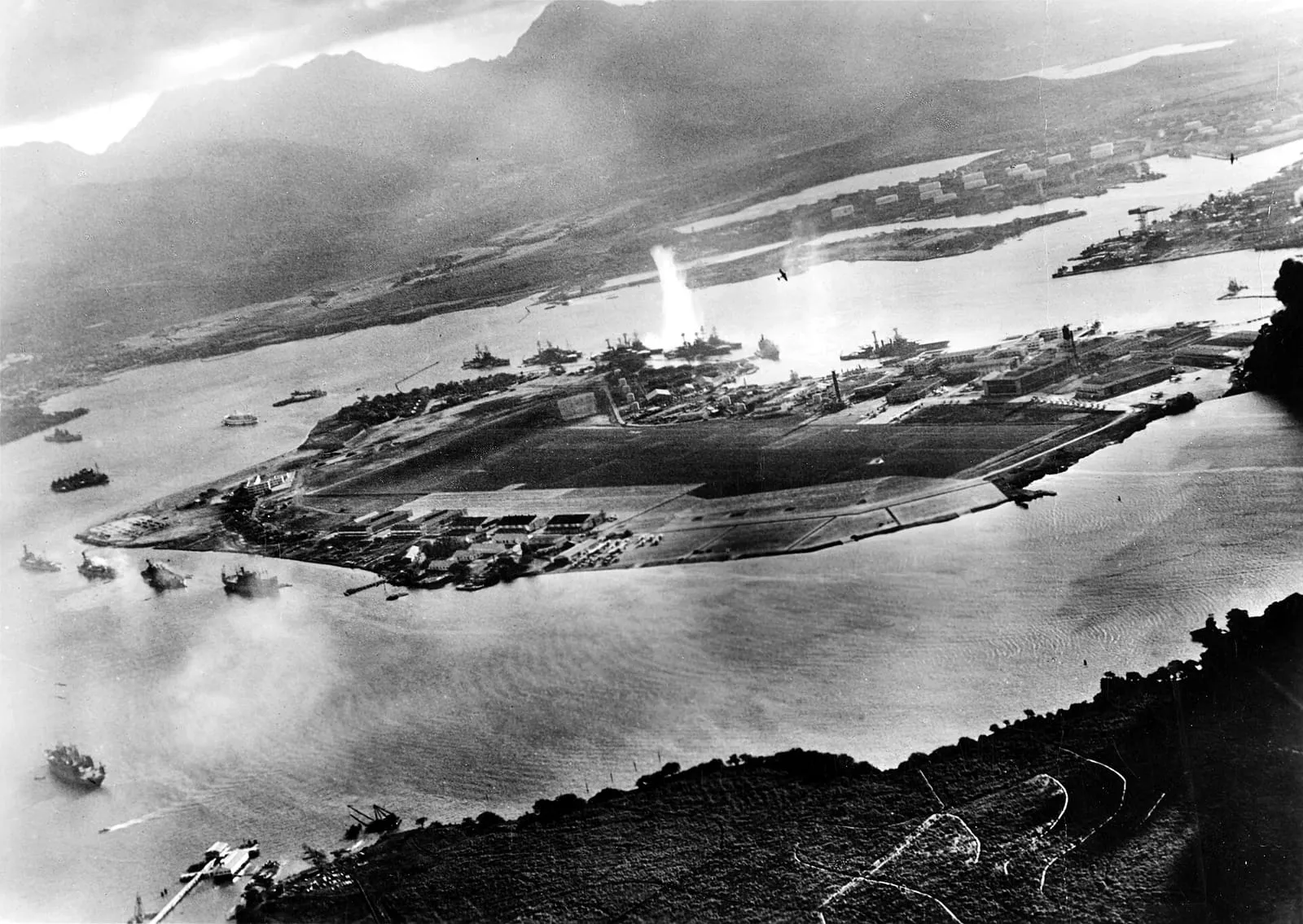 Photograph taken from a Japanese plane during the torpedo attack on ships moored at Ford Island, 7 December 1941.