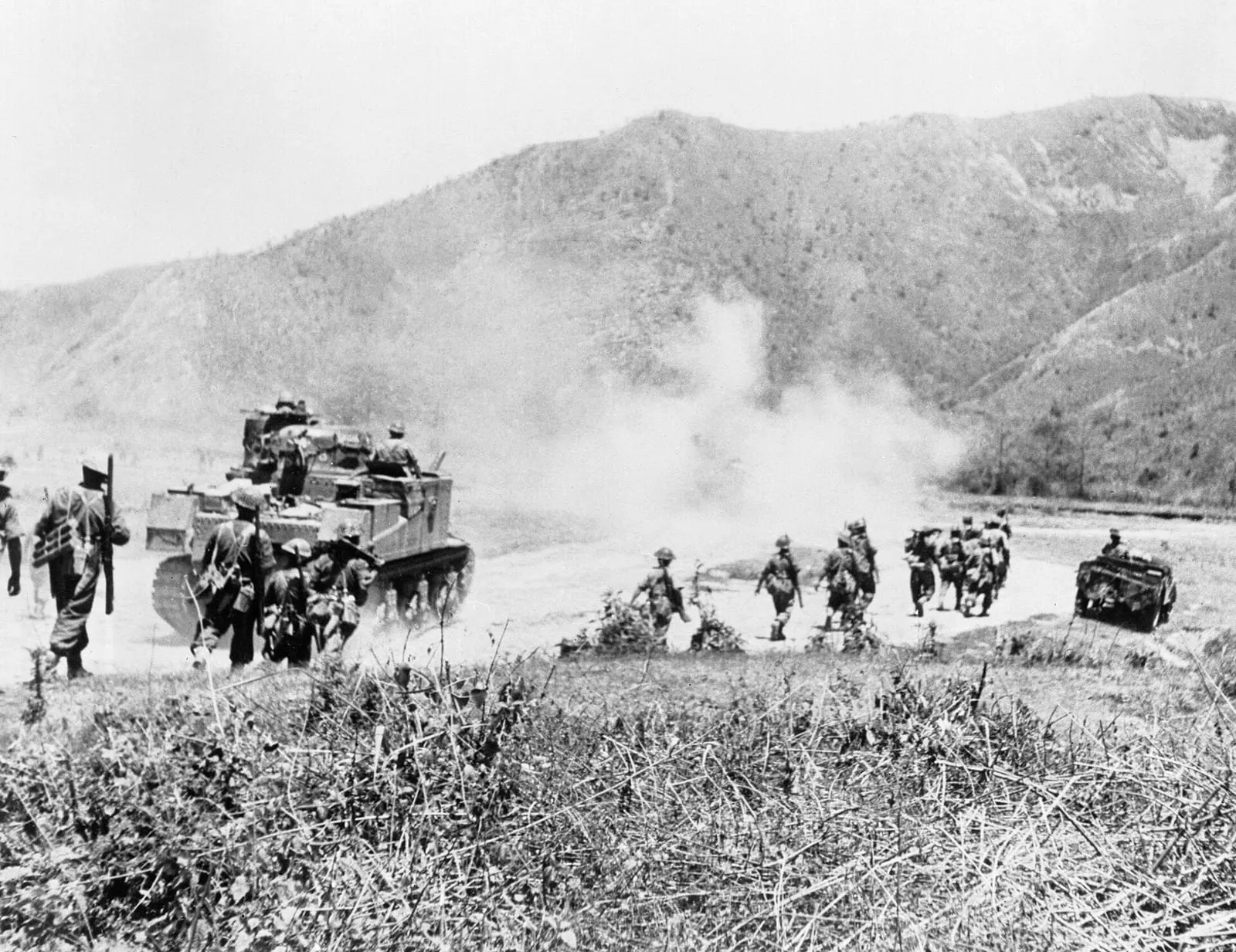 Gurkhas advancing with Lee tanks to clear the Japanese from the Imphal–Kohima road.