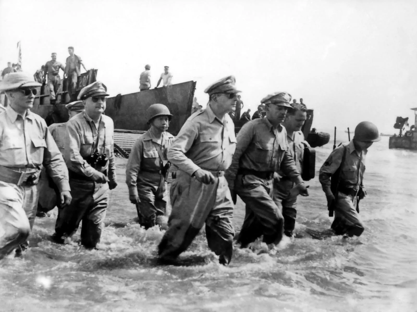 General Douglas MacArthur wading ashore during the Leyte landings, 20 October 1944.