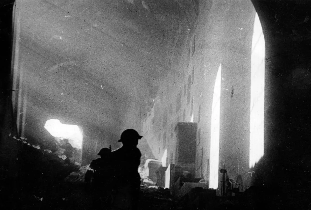 Polish soldiers inside the ruined monastery at Monte Cassino.