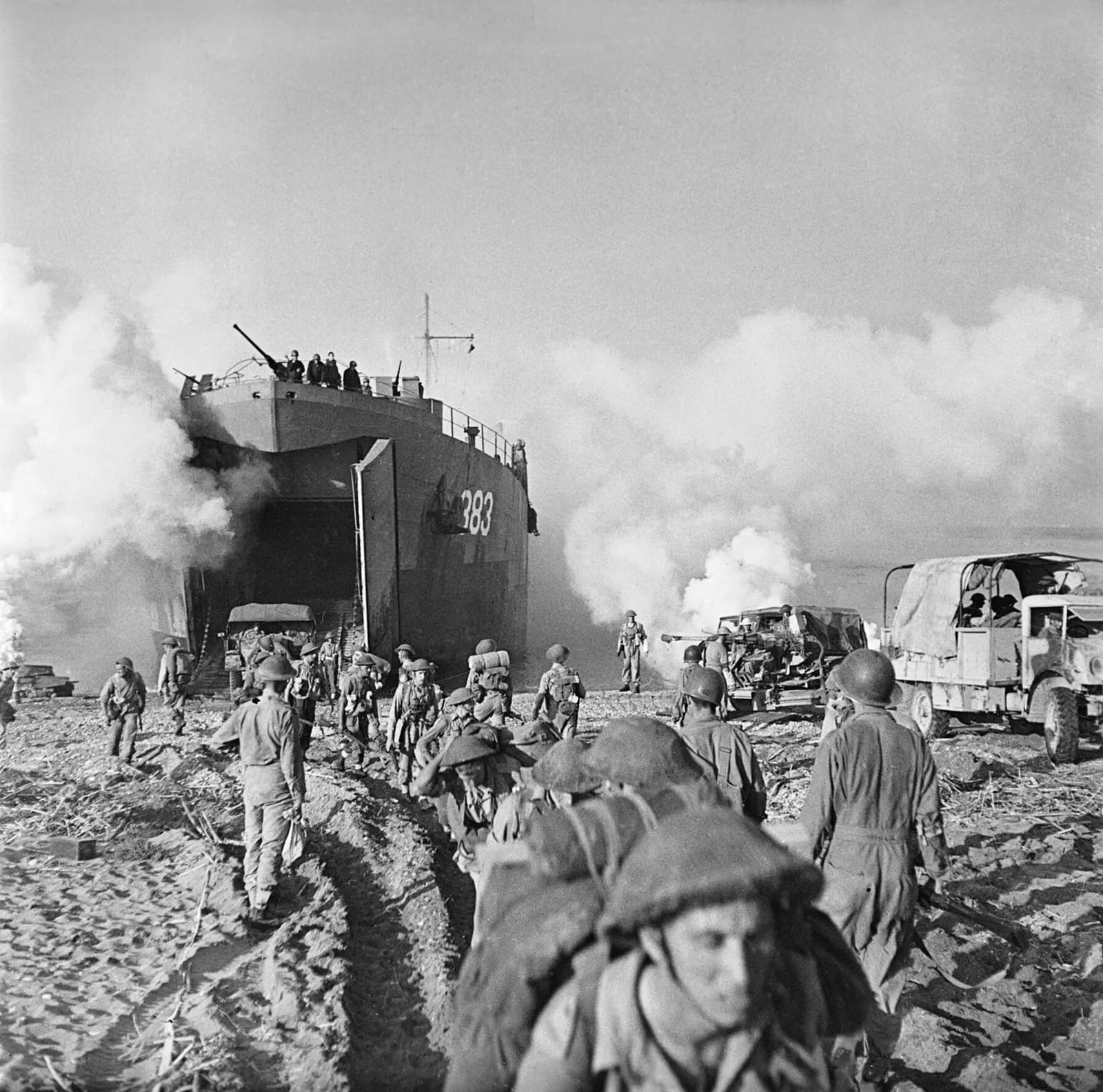 Salerno, 9 September 1943: troops and vehicles of the British 128th Brigade (46th Division) come ashore from LST 383.