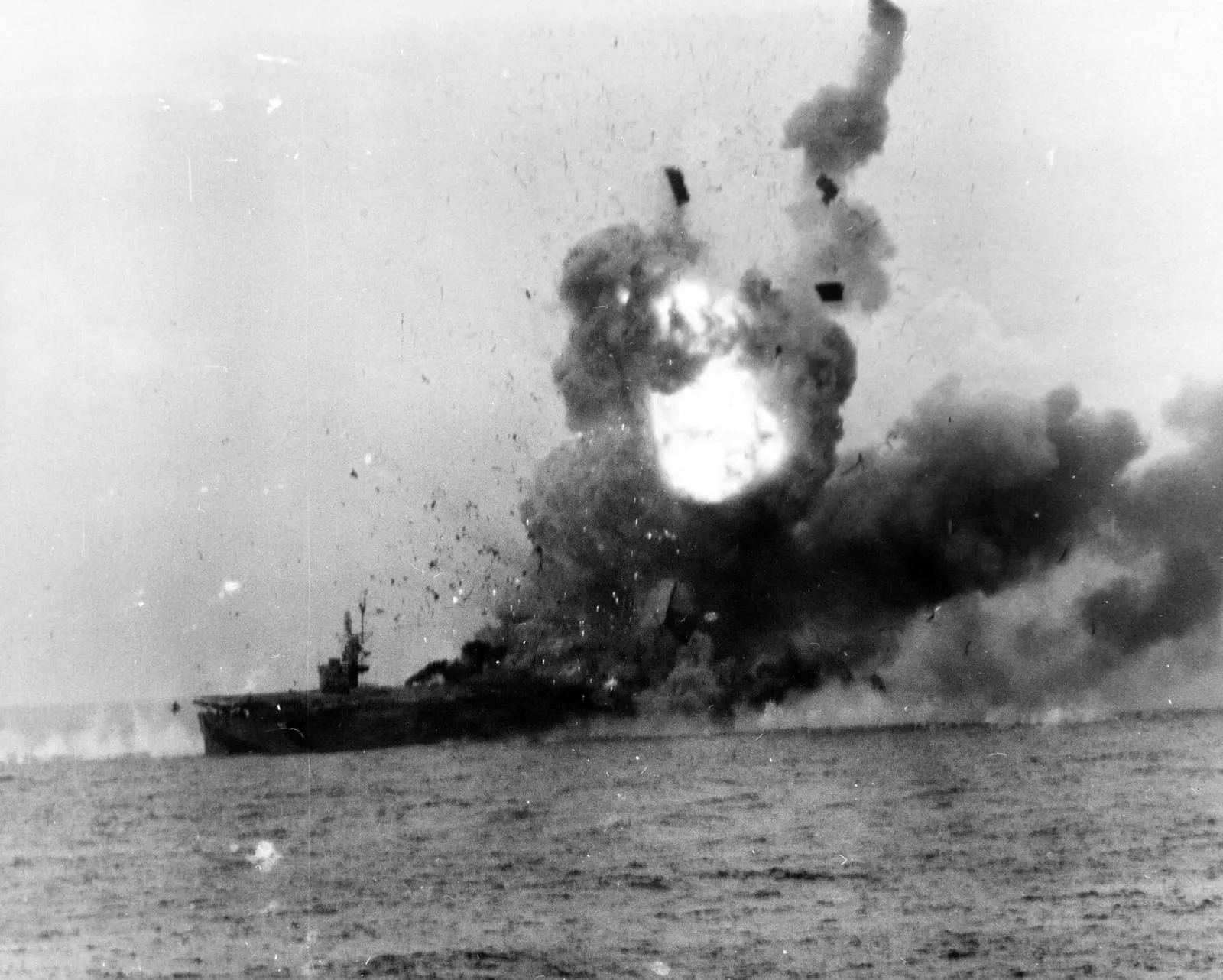 Explosion on the escort carrier USS St. Lo after a kamikaze hit during the Battle off Samar, 25 October 1944.