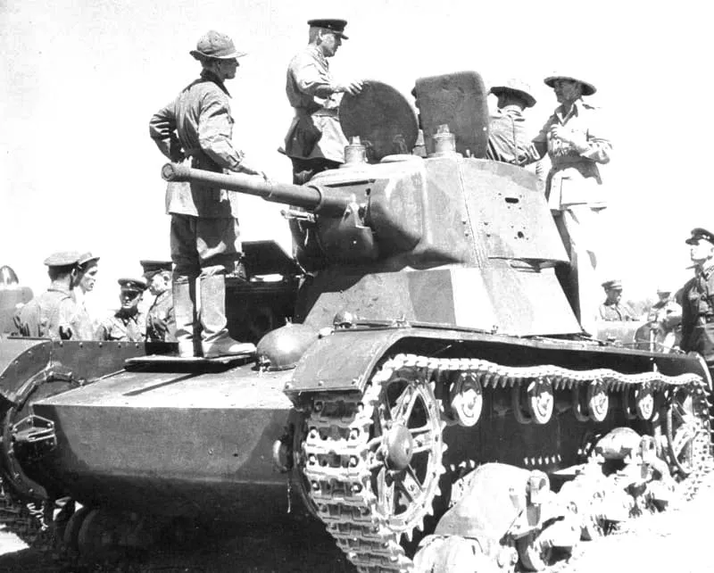 British soldiers inspecting a Soviet T-26 tank after the meeting of the two armies in Iran, August 1941.