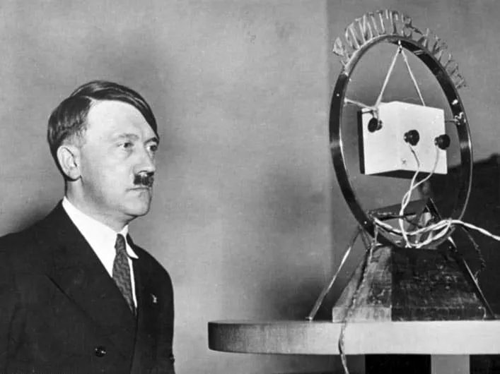 Hitler speaks before a radio microphone on 1 February 1933, two days after being appointed Reich Chancellor.