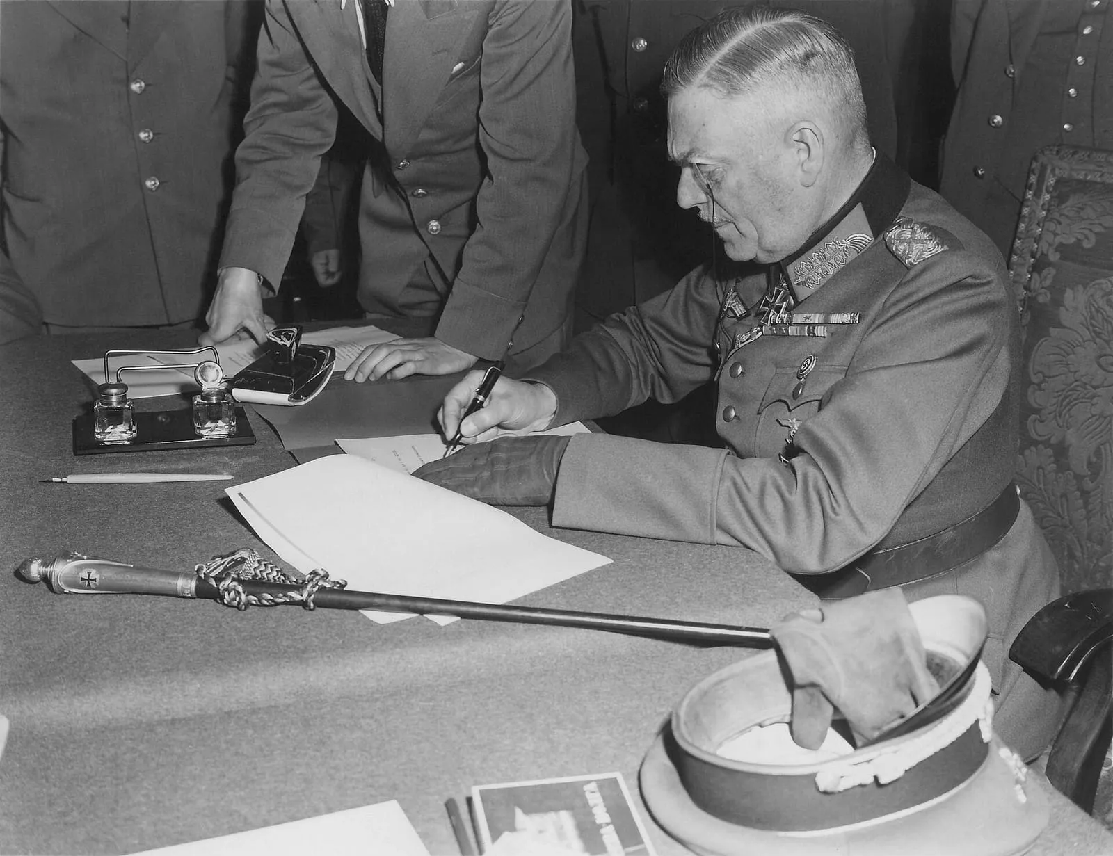 Field Marshal Wilhelm Keitel signs the unconditional surrender of the Wehrmacht at the Soviet headquarters in Karlshorst, Berlin, 8 May 1945.