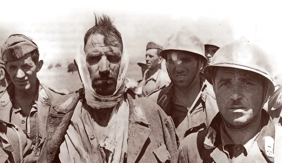 Italian soldiers of the 206th Coastal Division taken prisoner after the landing in Sicily, 10 July 1943.