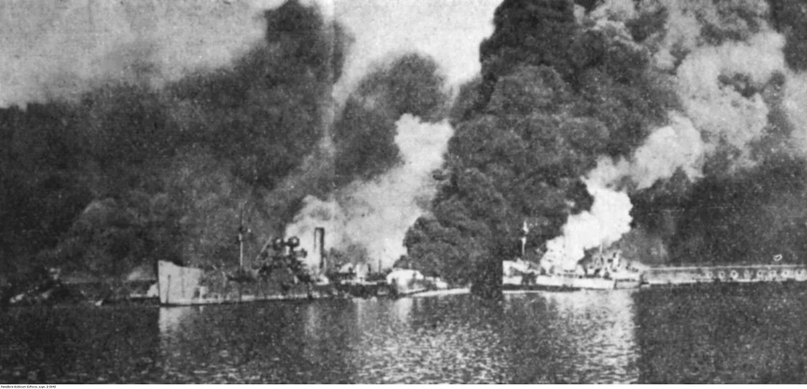 Ships burning in Bari harbour after the German air raid on the Allied fleet.