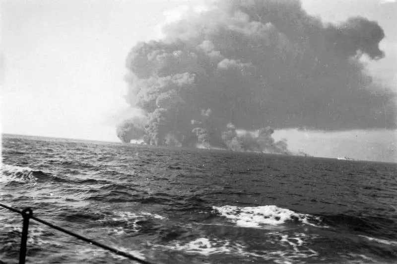 The merchant ship Waimarama explodes after being bombed, 13 August 1942.