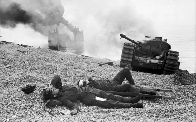 The beach at Dieppe in August 1942: a tank and fallen Allied soldiers.