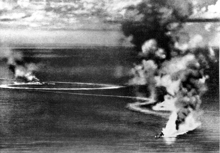 The Royal Navy heavy cruisers HMS Dorsetshire and HMS Cornwall under heavy air attack by Japanese carrier aircraft, 5 April 1942.