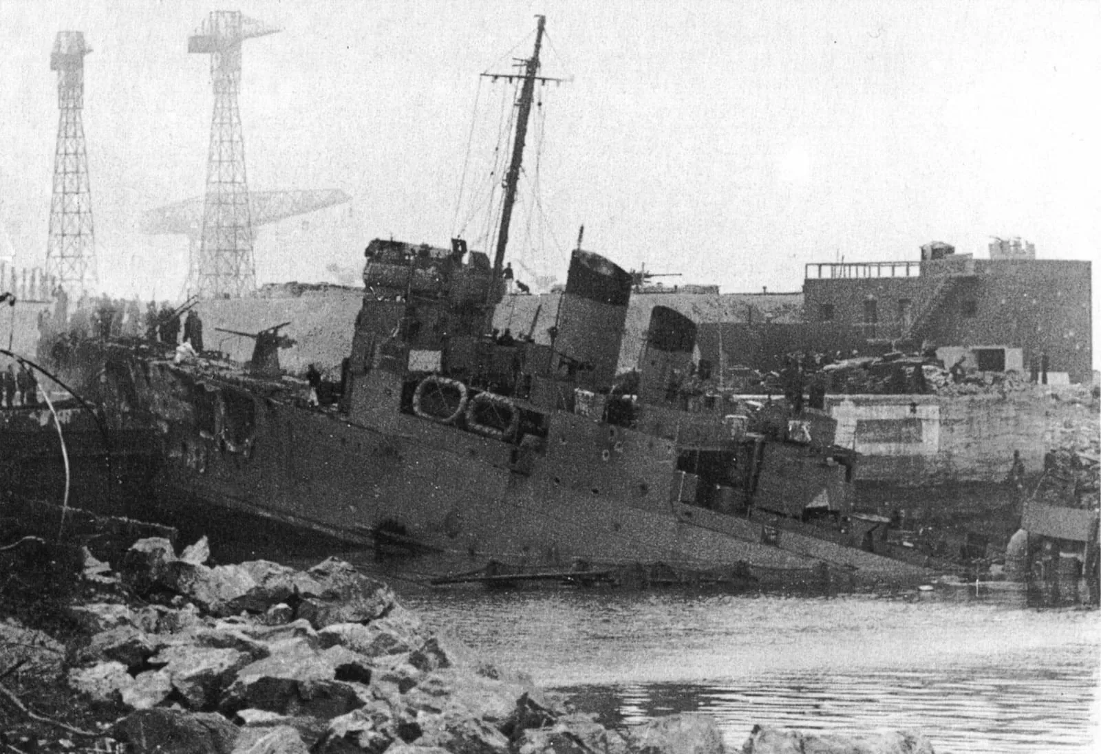 The wrecked destroyer HMS Campbeltown at St Nazaire, 28 March 1942.