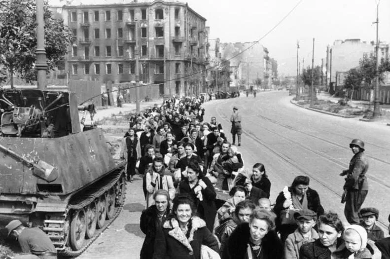 Civilians of the Wola district being led down Wolska Street, probably in early August 1944.