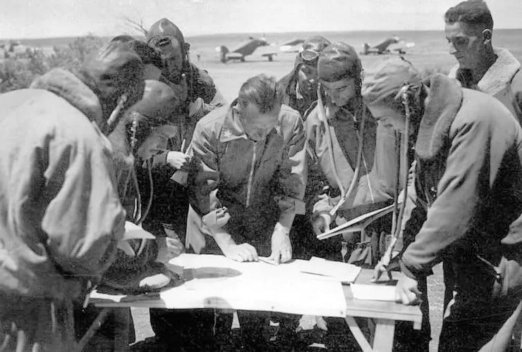 Italian pilots studying a map in Egypt, September 1940.