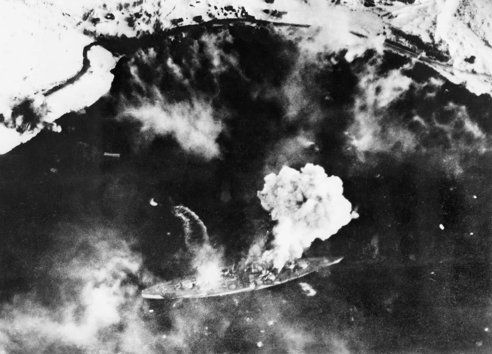 Fleet Air Arm aircraft attacking the battleship Tirpitz in Altafjord, Norway.